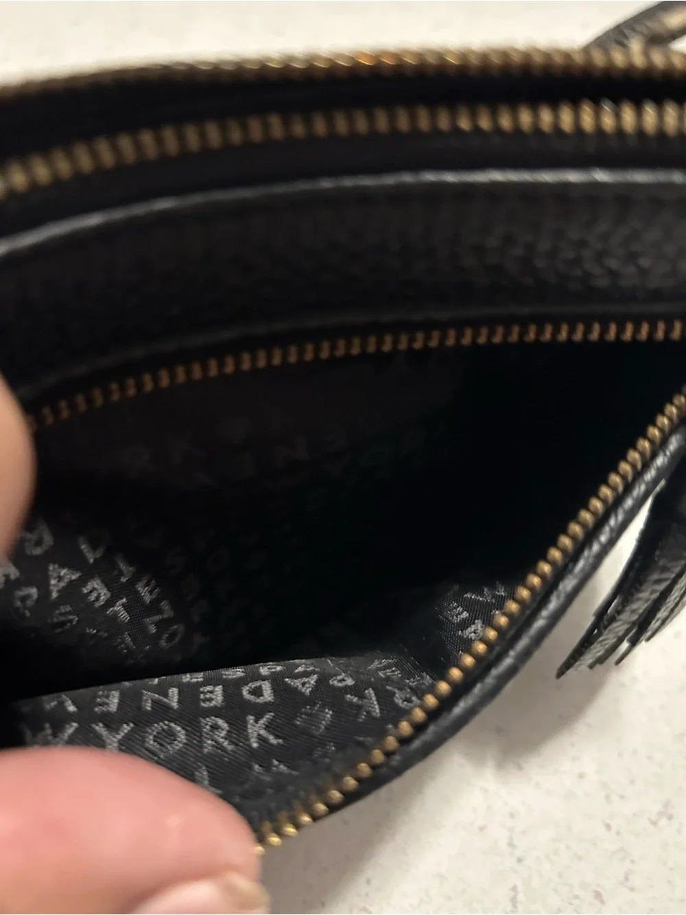 kate spade Black Pebble Leather Wristlet with Tassel